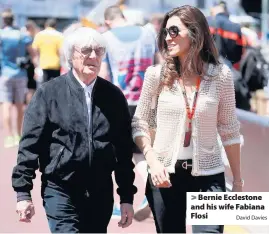  ?? David Davies ?? Bernie Ecclestone and his wife Fabiana Flosi