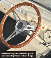  ??  ?? Woodrim steering wheel and Smiths’ gauges are modern interpreta­tions of classic designs.