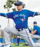  ?? FRANK GUNN/THE CANADIAN PRESS ?? Toronto Blue Jays pitcher Jesse Chavez stretches at spring training last week in Dunedin, Fla. He says his first tour with the team was a stepping-stone to how he performs today.