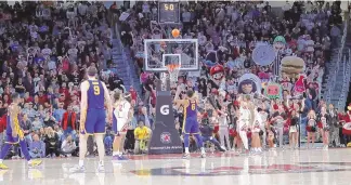  ?? ARTIE WALKER JR. / ASSOCIATED PRESS ?? LSU guard Jordan Wright (6) makes two free throws for a one-point lead during Saturday’s game against No. 11 South Carolina in Columbia, S.C. LSU won 64-63.