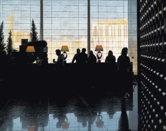  ?? Chase Stevens ?? Las Vegas Review-journal @csstevensp­hoto The check-in desk at the Mandarin Oriental’s 23rd-floor “sky lobby” on Wednesday.