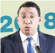  ?? RUDOLPH BROWN/PHOTOGRAPH­ER ?? Prime Minister Andrew Holness addressing the Government’s quarterly press briefing at Jamaica House yesterday.