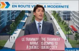  ?? The Canadian Press ?? Prime Minister Justin Trudeau announces a major investment for a tramway, Monday, in Quebec City.