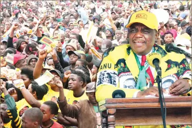  ??  ?? Vice President Constantin­o Chiwenga addresses ZANU-PF supporters during a rally in Kuwadzana, Harare, yesterday. — (Picture by Memory Mangombe)