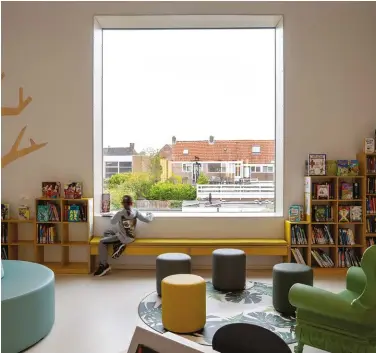  ??  ?? ABOVE: Studio Nauta and De Zwarte Hond ensured natural light was integral to all interior spaces. Large rectangula­r windows in the classrooms maintain this connection to the outside.