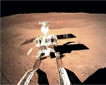  ?? XINHUA/AP ?? China’s Yutu-2 rover leaves wheel tracks in the lunar dust after leaving the lander that touched down on the far side of the Moon this week.