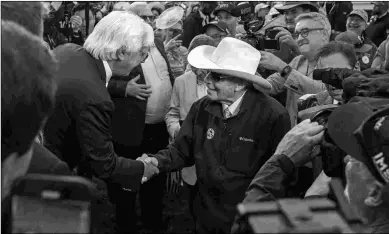  ?? BARBARA D. LIVINGSTON ?? Eight-time Preakness winner Bob Baffert (left) congratula­tes D. Wayne Lukas on his seventh victory in the middle jewel of the Triple Crown.