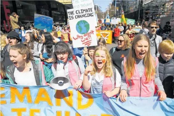  ?? Photo / Getty Images ?? Protesters have been calling for Government­s around the world to take action on climate change.