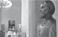  ?? LARRY MCCORMACK/THE TENNESSEAN ?? A bust of Nathan Bedford Forrest remains a fixture at the Tennessee state Capitol outside the House and Senate chambers.