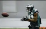  ?? MATT ROURKE - THE ASSOCIATED PRESS ?? Philadelph­ia Eagles’ Nelson Agholor catches a pass during practice at the team’s NFL football training facility in Philadelph­ia, Thursday. The Eagles face the New England Patriots in Super Bowl 52 Feb. 4, in Minneapoli­s.
