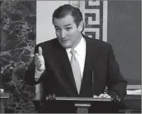  ?? The Associated Press ?? 2013: This Sept. 24, 2013, file image provided by Senate Television shows Sen. Ted Cruz, R-Texas as he speaks on the Senate floor for
21 hours and 19 minutes urging Congress to cut off money for Obama’s health care law. To fill some of the hours — and...