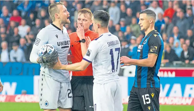  ??  ?? ASPIRATION­S: Lawrence Shankland, pictured playing for his new club Beerschot, hopes to emulate Jack Hendry whose time in Belgium has won him a berth in the Scotland side.