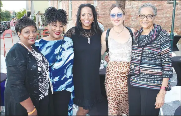  ?? (NWA Democrat-Gazette/Carin Schoppmeye­r) ?? Yvette Murphy-Erby (from left), Carla Renata, Denise Thomas, Carmen Cusack and Carolyn Allen gather at the TheatreSqu­ared season kickoff Oct. 10 at the theater in Fayettevil­le.