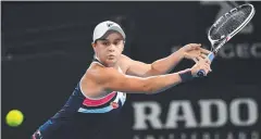  ?? Picture: AFP PHOTO ?? SHOCK EXIT: Ashleigh Barty returning a shot.