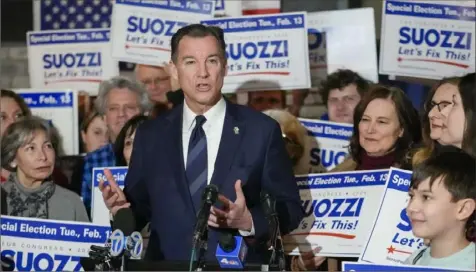  ?? Mary Altaffer/Associated Press ?? Tom Suozzi speaks during a campaign canvass kickoff event Sunday in Plainview, N.Y. Mr. Suozzi, a Democratic, won a closely watched special House election in New York on Tuesday, narrowing the Republican majority in Washington and offering his party a potential playbook to run in key suburban swing areas in November.