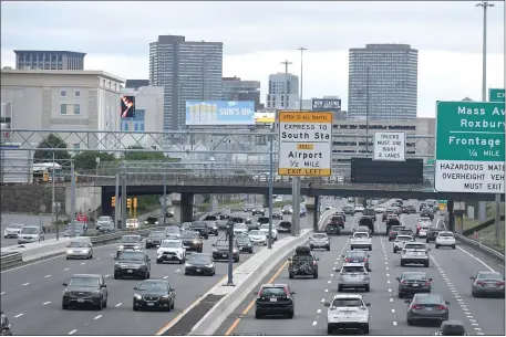  ?? ?? Boston drivers, seen here on I-93 near the South Bay Center, have one of the worst commutes in the country. (Jim Michaud/Boston Herald