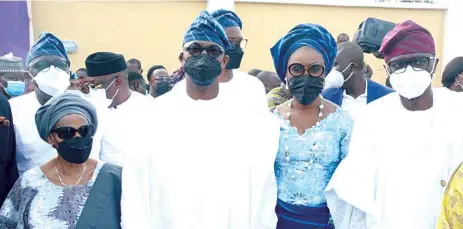  ??  ?? Mother of Ogun State Governor, Mama Victoria Olaitan Abiodun ( left); Governor Dapo Abiodun; his wife, Bamidele and Lagos State Governor, Babajide Sanwo- Olu during the Christian wake in honour of the governor’s late father, Dr. Emmanuel Abiodun, at Iperu Remo… yesterday.