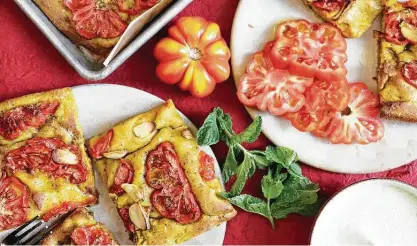  ?? Ajna Jai / Contributo­r ?? Tomato Bread is juicy and delicious, thanks to heirloom tomatoes from the farmers market.