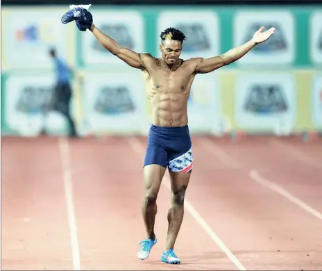  ?? Picture: CHRIS RICCO, BACKPAGEPI­X ?? DO YOU WANT MY SHIRT? Henricho Bruintjies celebrates after winning the men’s 100m final at the national championsh­ips in Stellenbos­ch on April 15.  