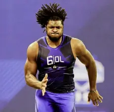  ?? Brian Spurlock/USA Today ?? Pitt offensive lineman T.J. Clemmings works out at the scouting combine in February. He went to Minnesota in the fourth round.