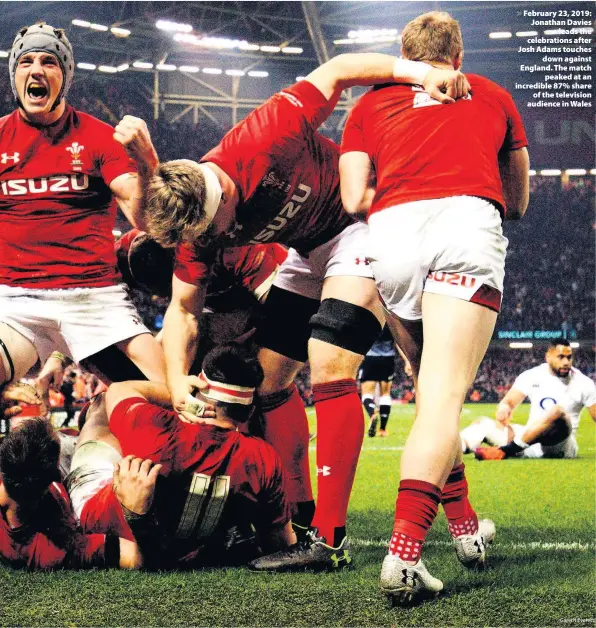  ?? Gareth Everett ?? > February 23, 2019: Jonathan Davies leads the celebratio­ns after Josh Adams touches down against England. The match peaked at an incredible 87% share of the television audience in Wales