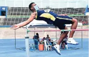  ??  ?? Leopaul Foster of John Mills winning the boys’ high jump Open with a mark of 1.70m on Day One of the 40th INSPORTS All-Age and Junior High Athletics Championsh­ips at the National Stadium, yesterday.