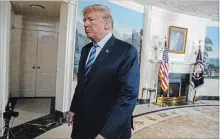  ?? EVAN VUCCI
THE ASSOCIATED PRESS ?? President Donald Trump leaves the room after announcing at the White House on Tuesday the U.S. is withdrawin­g from the Iran nuclear deal.