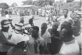  ??  ?? Liberians wait to cast their votes during a presidenti­al election in Monrovia yesterday. AFP