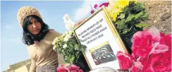  ?? Picture: Jackie Clausen ?? Ashika Pramlal at the grave of her dog Coco.