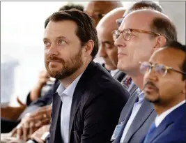  ?? ALEX SLITZ — THE ASSOCIATED PRESS ?? Jason Carter, grandson of former President Jimmy Carter, left, listens during a ceremony honoring President Carter and Jimmy Carter Boulevard on Tuesday in Norcross, Ga.