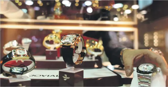  ?? Sammy Dallal / The National ?? Sales of luxury watches fell 50% by volume and 20% by value in the Gulf last year as fewer tourists visited owing to travel restrictio­ns