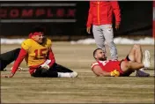  ?? CHARLIE RIEDEL — THE ASSOCIATED PRESS ?? Kansas City Chiefs quarterbac­k Patrick Mahomes (15) and tight end Travis Kelce stretch during a workout Thursday in Kansas City, Mo. The Chiefs are scheduled to play the Philadelph­ia Eagles in Super Bowl LVII on Sunday.