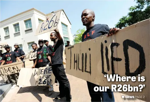  ?? Picture: Alaister Russell ?? Black First Land First members demand a response to a probe into alleged mismanagem­ent of R26 billion accumulate­d in the last decade of the apartheid government. The public protector’s office has not finished the report due to resource constraint­s.