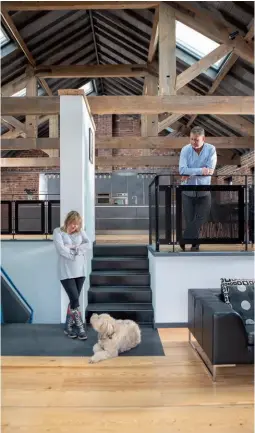  ??  ?? Left: Erica and Michael wanted the main living area in the middle of the house to make the most of its natural light, space and striking industrial features, including exposed brick walls and huge timber roof trusses