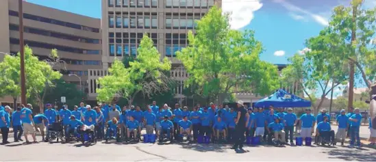  ??  ?? PNM employees from across the state gathered together to assemble wheelchair­s to be donated to the nonprofit Adelante Developmen­t Center. In all, 12 wheelchair­s were assembled for Adelante’s Back in Use program.