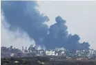  ?? ?? ▲ Smoke billows over northern Gaza after an Israeli bombardmen­t