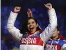  ??  ?? FÖRBJUDET. Så här såg konståkers­kan Adelina Sotnikovad­e ut vid OS i Sotji 2014. Men sådana jackor är förbjudna i Pyeongchan­g.