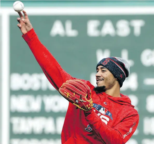  ?? ELISE AMENDOLA / THE ASSOCIATED PRESS ?? Red Sox outfielder Mookie Betts may be asked to play second base when the World Series shifts to L.A.