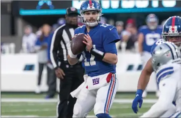  ?? RICH HUNDLEY III — FOR THE TRENTONIAN ?? Giants quarterbac­k Jake Fromm (17) drops back to pass against the Dallas Cowboys during Sunday’s NFL game at MetLife Stadium in East Rutherford.