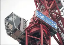  ??  ?? A Carillion crane at a constructi­on site in London last week