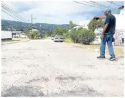  ??  ?? Kingsley Close, Glendale, in St Andrew North West had deteriorat­ed to the point that residents opted to pool funds, purchase concrete mix and administer temporary repairs.