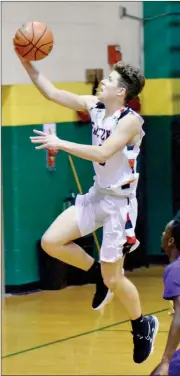  ?? PILOT PHOTO/BEV HARAMIA ?? Silas Kaser scores two of his 13 points on this breakaway layup.