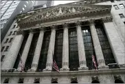  ?? ASSOCIATED PRESS FILE PHOTO ?? The New York Stock Exchange facade is pictured in downtown Manhattan.