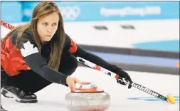  ?? Natacha Pisarenko / Associated Press ?? Canada’s skip Rachel Homan throws a stone during match in South Korea.