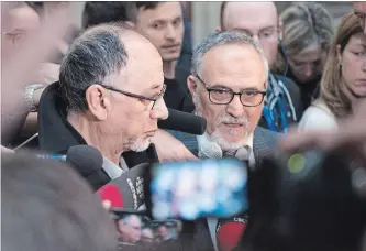  ?? JACQUES BOISSINOT THE CANADIAN PRESS ?? Quebec Islamic Cultural Centre members Boufeldja Benabdalla­h, left, and Mohamed Labidi speak at a news conference Wednesday following Alexandre Bissonnett­e’s guilty plea for the 2017 mosque shooting.