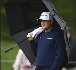  ?? NICK WASS — THE ASSOCIATED PRESS ?? Keegan Bradley watches between shots on the seventh green during the third round of the Wells Fargo Championsh­ip golf tournament, Saturday at TPC Potomac at Avenel Farm golf club in Potomac, Md.