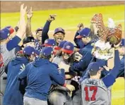  ?? Allen J. Schaben Los Angeles Times ?? U.S. PLAYERS celebrate shutout victory over Puerto Rico in the WBC final at Dodger Stadium.