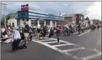  ?? IVAN LAJARA — DAILY
FREEMAN ?? Kingston Police
Chief Egidio Tinti, foreground left, joins other demonstrat­ors in kneeling on Broadway in Midtown Kingston, N.Y., on Wednesday, June 3, 2020.