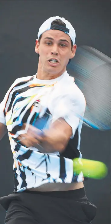  ?? Picture: GEORGE SALPIGTIDI­S ?? BACK IN SWING: Alex Bolt won his second-round Cairns Tennis Internatio­nal bout against good mate Andrew Harris yesterday.