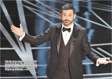  ??  ?? This file photo taken on Feb 26, 2017 shows host Jimmy Kimmel delivering a speech on stage at the 89th Oscars in Hollywood, California. — AFP photo